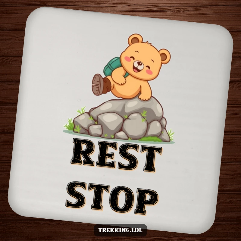 Funny bear hiking coaster featuring a cheerful bear in hiking boots climbing a mossy rock, adding humor to table settings.