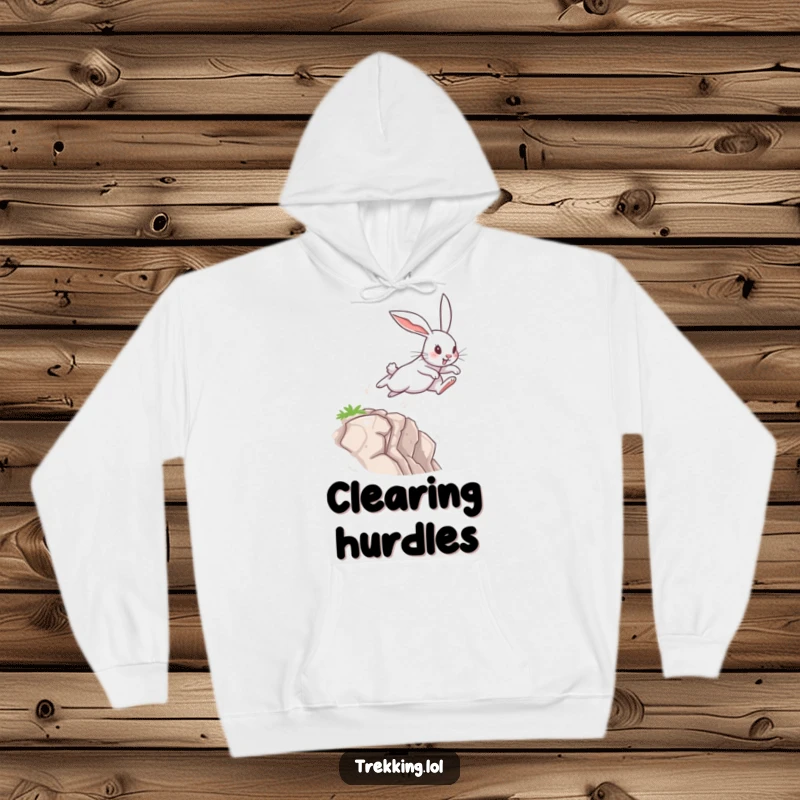 Funny Hoodie depicting a determined rabbit leaping across a chasm, providing warmth and a humorous reminder of overcoming challenges.