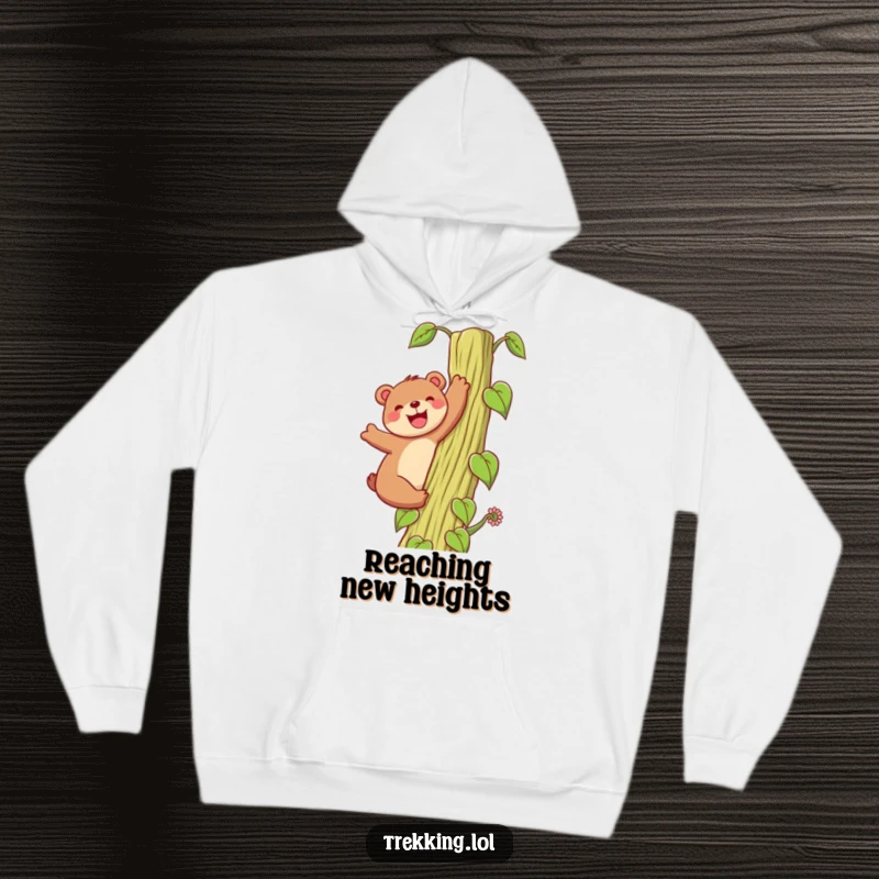 Funny Hoodie: A happy bear grins while enthusiastically climbing a towering beanstalk, offering cozy comfort and a spirit of adventure.