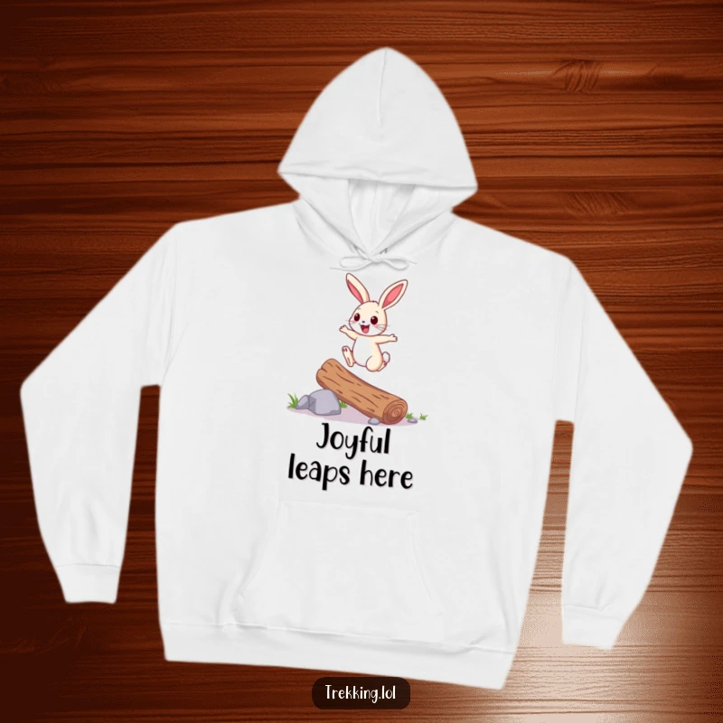 Funny Hoodie: A cheerful bunny hops over a fallen log with joyful energy, offering cozy comfort and a reminder of playful spirits.