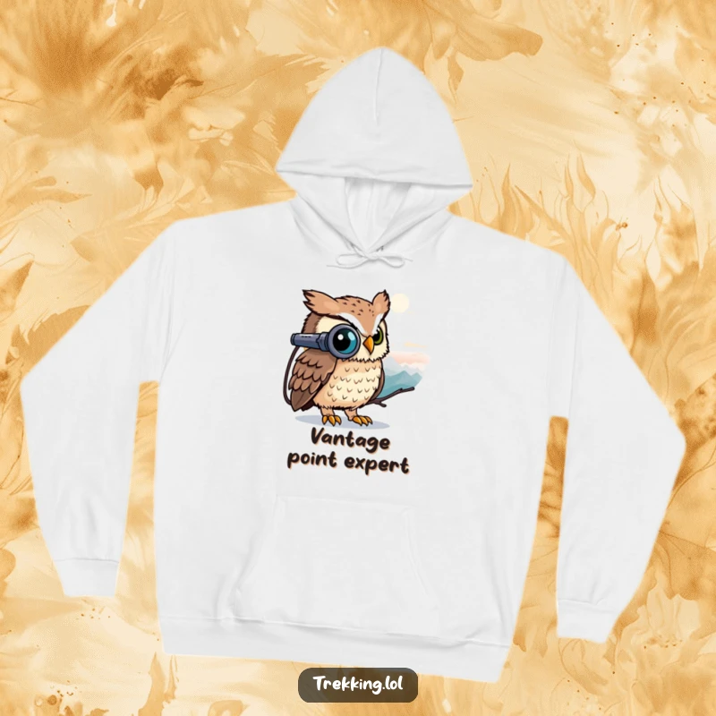 Funny curious owl peeking through binoculars at a distant peak, depicted on a warm and funny hoodie.