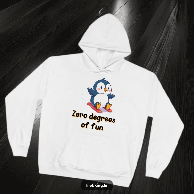 Funny hoodie depicting a courageous penguin in mid-slide down a snowy mountain, radiating excitement and the joy of winter.