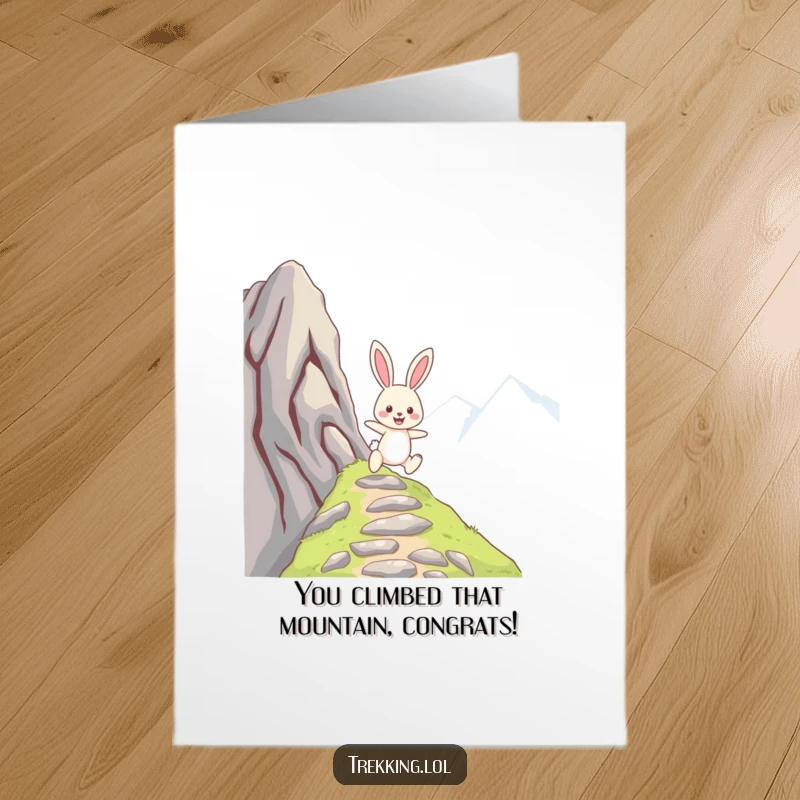 Funny Free Printable Congratulations Card: Cheerful bunny gleefully skipping up a steep mountain path, celebrating success. A perfect downloadable gift.