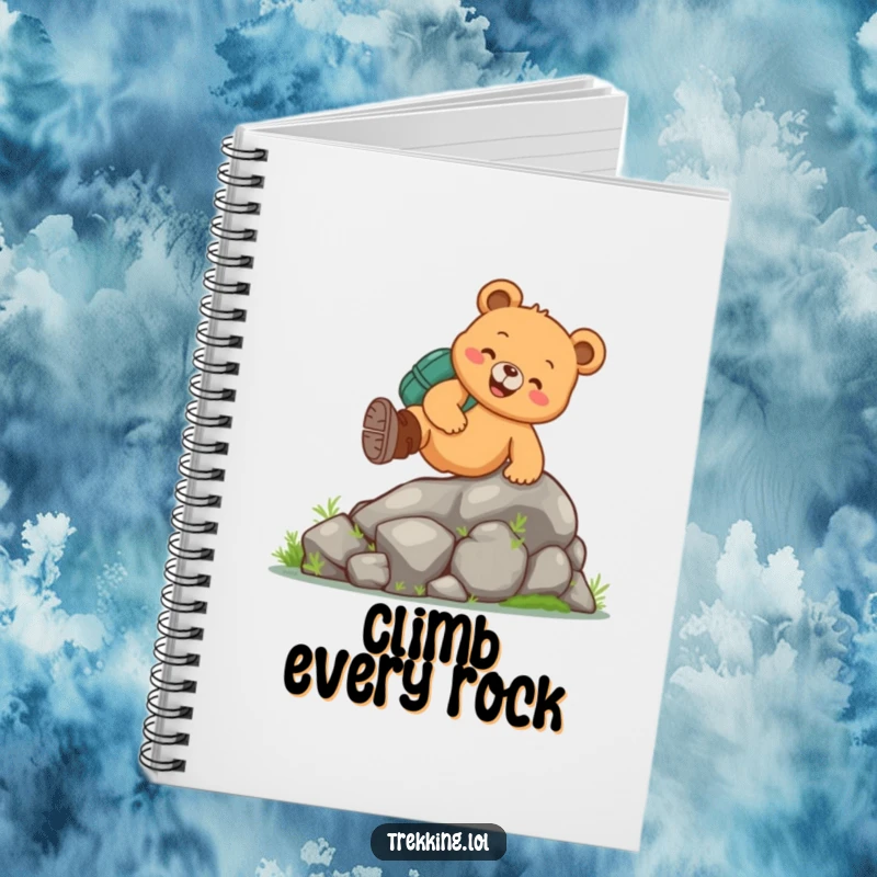 Funny bear hiking notebook featuring a cheerful bear wearing hiking boots, climbing a mossy rock, perfect for logging outdoor experiences.