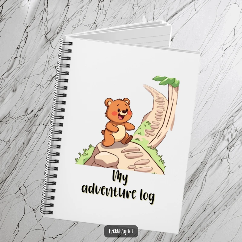 Funny notebook featuring a determined bear gleefully navigating a steep, winding path, ideal for journaling outdoor adventures.