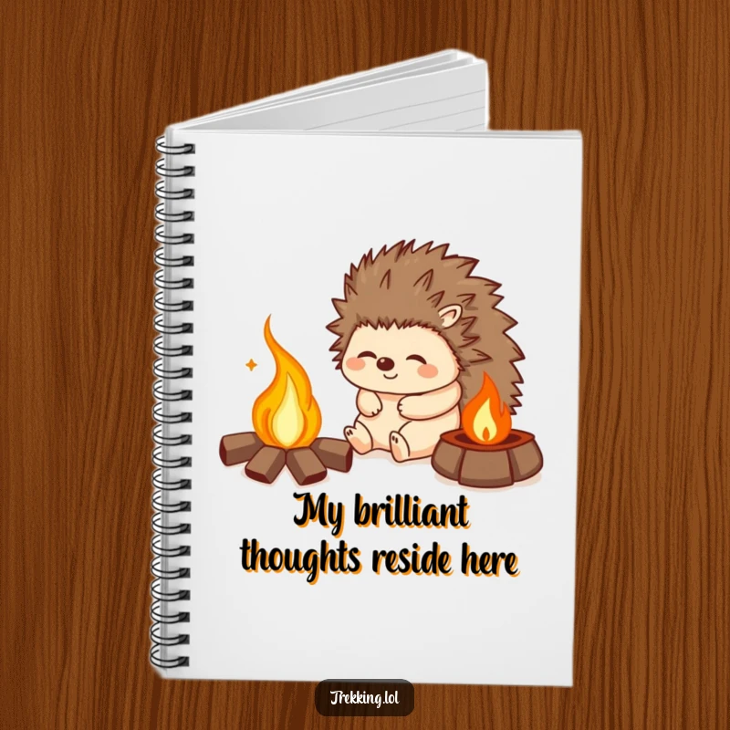 Funny notebook featuring a happy hedgehog sighing contentedly by a campfire, perfect for writing and note-taking.