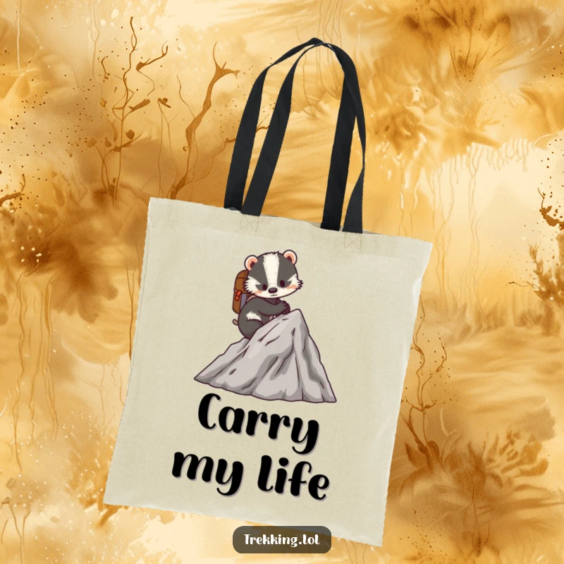 Funny tote bag with a determined badger scaling a miniature mountain with a tiny backpack, perfect for carrying gear.